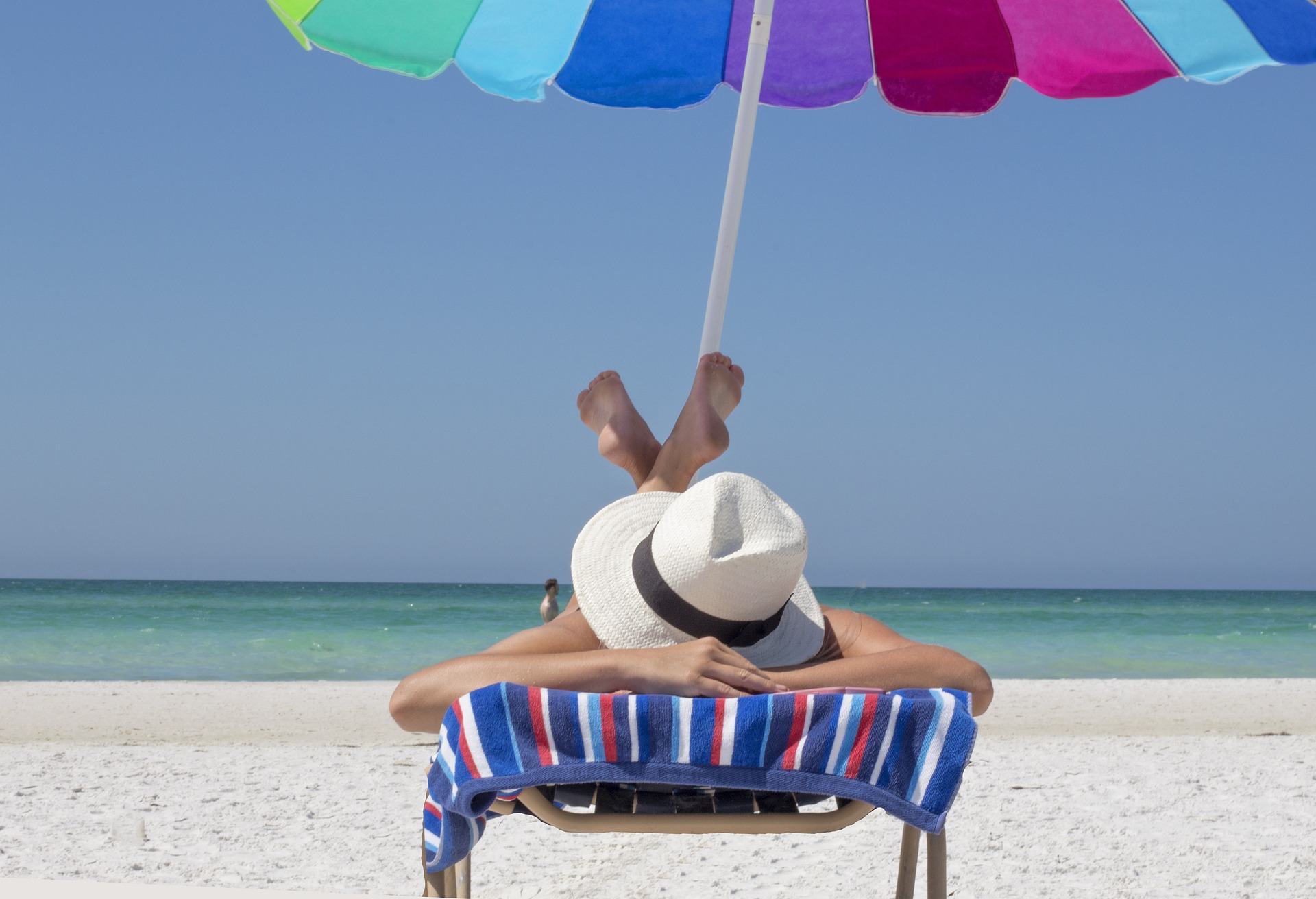 a person relaxing on the beach